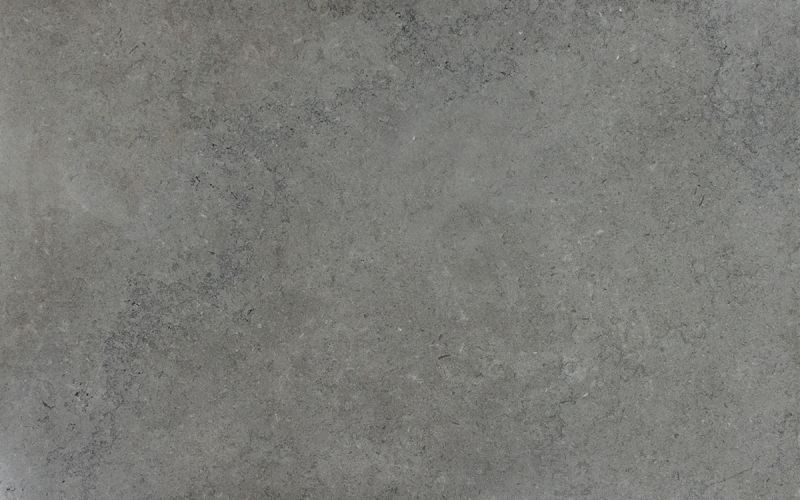 schöner mittelgrauer Muschelkalkstein mit fossilen Einschlüssen