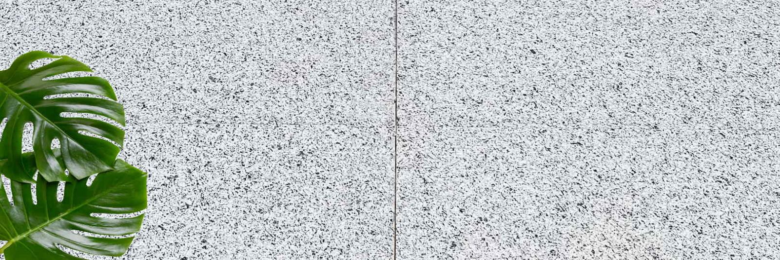 weiße Granit Terrasenplatten grau gesprenkelt